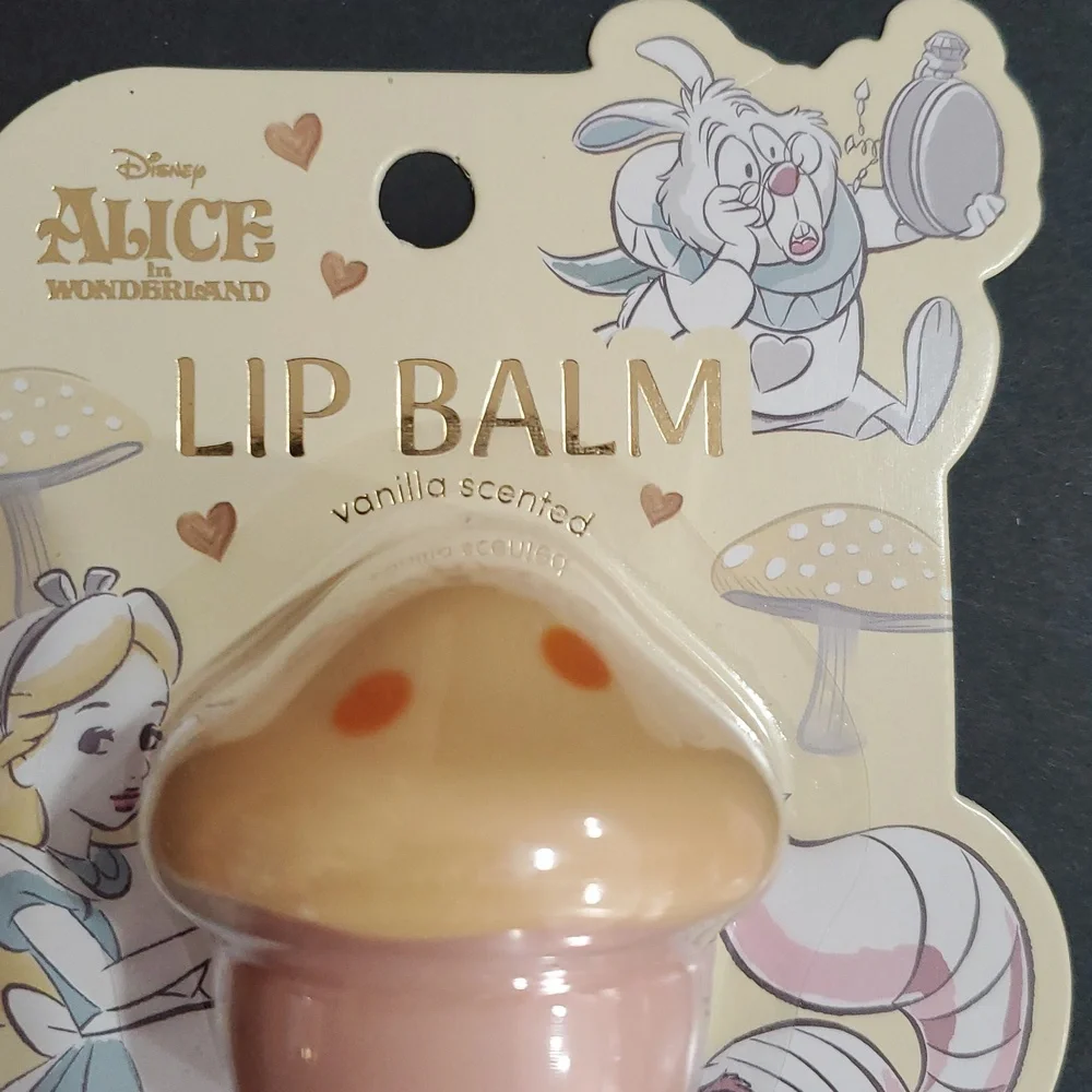 Disney's Alice in Wonderland raspberry vanilla and coconut scented lip balms new